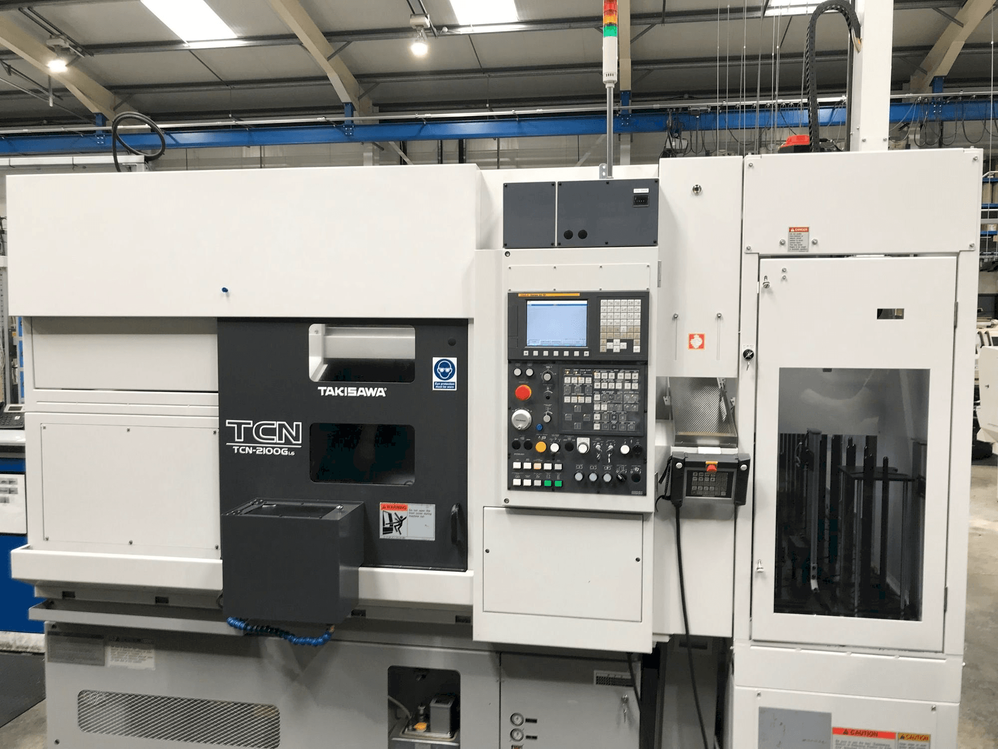 Mašīnas Takisawa TCN-2100G L6 pretskats