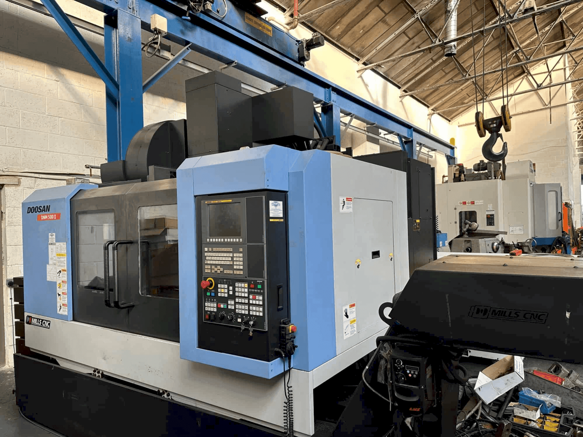 Mašīnas DOOSAN DNM 500 II pretskats