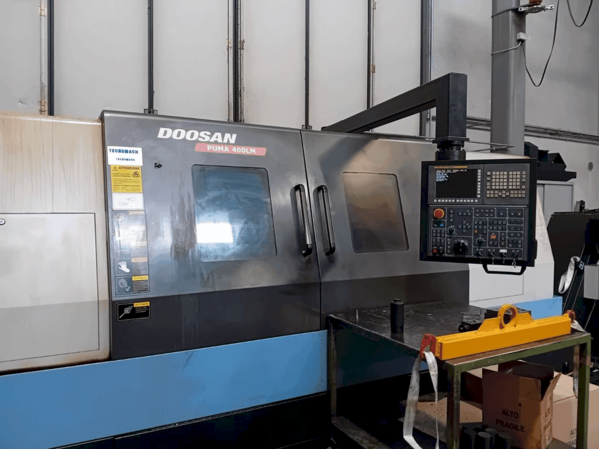 Mašīnas DOOSAN PUMA 400LM pretskats