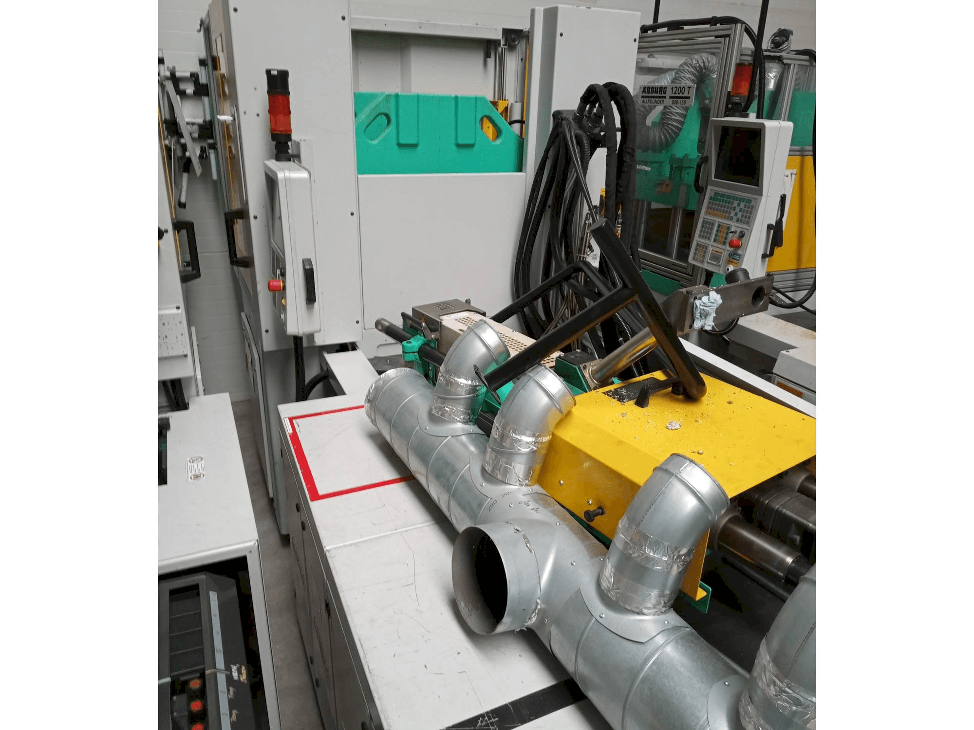 Mašīnas Arburg Allrounder 1200T-800-170 pretskats